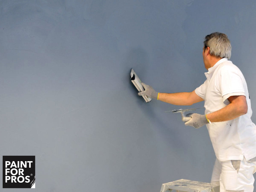 MagnetPlaster being applied to a wall